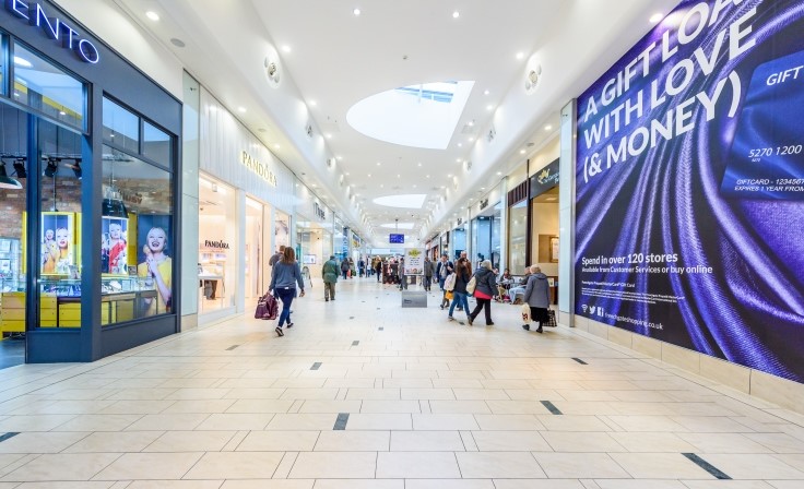 Inside Frenchgate Shopping Centre view of shops and shoppers